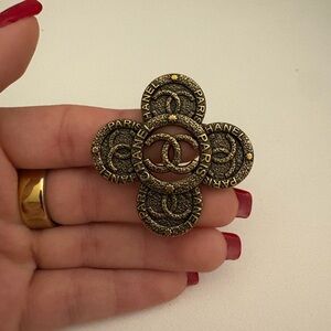 CHANEL Black and Gold Brooch